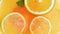 Closeup slow motion video of cold lemonade with oranges, grapefruits and fresh mint leaves