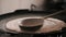 Closeup slow motion view of  steaming hot `Dosa` on a cast iron pan