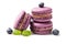 Closeup of small macaroons with blackberries