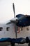 Closeup of small propeller aircraft in Kathmandu airport, Nepal