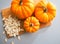 Closeup on small pumpkins and seeds on table