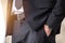 Closeup smart businessman hand at pocket