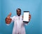 Closeup of smiling medical doctor giving thumbs up while holding smartphone with white screen