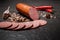 Closeup smoked cervelat salami sausage with garlic and chili