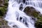 Closeup smooth flow water from Mae Phun waterfalls