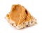 Closeup of smooth peanut butter on multi-grain toast isolated on