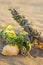 Closeup of smudge sticks on a sandy beach on a sunny day