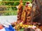 Closeup of Snake Statue in stone or Nagara Kallu in a Temple under the Pipal Tree doing puja during festival