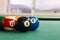 Closeup snooker billards ball on table with green surface