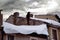 Closeup of snow accumulated on the edge of a roof