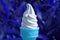 Closeup Soft Serve Ice Cream Cone in Pop Art Style Light Aqua Blue on Vivid Blue Background