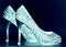 A closeup of sparkling high heel shoes,