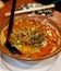 closeup spicy miso soup udon