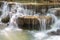 Closeup spring water cascades in deep forestCloseup deep forest waterfalls in national park