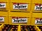 Closeup of stacked beer crates with logo lettering of jupiler brewery