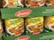 Closeup of stacked cans with Erasco lentil stew in shelf of german supermarket