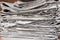 Closeup Stacked and piled up newspapers for background