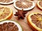 Closeup of a Star Anise and slices of dried fruit