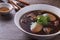 Closeup stewed eggs on wood table