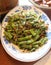 Closeup of Stir fried long beans chinese style on dish