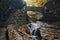 Closeup of a stone bridge over Rainbow Falls in Watkins Glen State Park