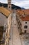 Closeup of the Stradun street in between old stone houses in Dubrovnik, Croatia