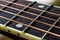 Closeup Of Strings And Fretboard Of Guitar