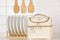 Closeup studio shot of cream beige color large multifunction multipurpose utility newborn baby toddler accessories handbag with