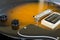 Closeup of sunburst golden electric guitar body