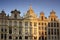 Closeup on the sunset light from some of the beautiful buildings from Grand Place - Brussels (Bruxelles), Belgium