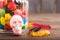 Closeup sweet skull wit sweet worms over wooden background