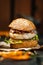 Closeup tasty chiken burger dark wooden background