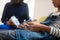 Closeup of teenage girl holding zapper electrodes