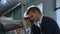 Closeup Teenager in Uniform Take Bun on Hand in School Cafeteria