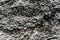 Closeup of texture of basalt stones on the beach of Vik, Iceland.