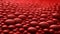 Closeup of textured rubber A detailed view of red rubber with a raised dot pattern. The texture is slightly soft to the