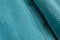 Closeup textures of turquoise towel.