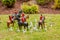 Closeup of tiny model fox hunters at a model village