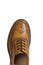 Closeup of Tip Medalion of One Brogue Derby Shoe of Calf Leather with Rubber Sole Over Pure White Background