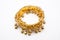 Closeup to Golden Old Small Bell Bangle in Indian Style, Isolated