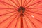 Closeup to Under Bamboo Orange Red Umbrella