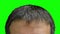 Closeup Top head adult caucasian man green screen