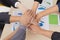 Closeup topview businesspeople join hand together.Stack of people hands. Unity and Team Teamwork Empower business worker for
