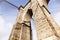 Closeup of tower and cables of brooklyn bridge in new york