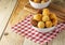 Closeup of traditional brazilian party snack mix with coxinha, kibe, and other fried snacks on table