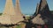 Closeup traditional village houses roofs at green countryside of Sumba Island