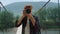 Closeup traveler taking camera photo. Professional photographer enjoy mountains.