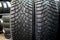 Closeup of the tread of two different studded winter tires