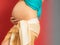 Closeup tummy of pregnant woman