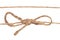 Closeup of twine node or knot with bow and one rope isolated on a white background. Decoration background